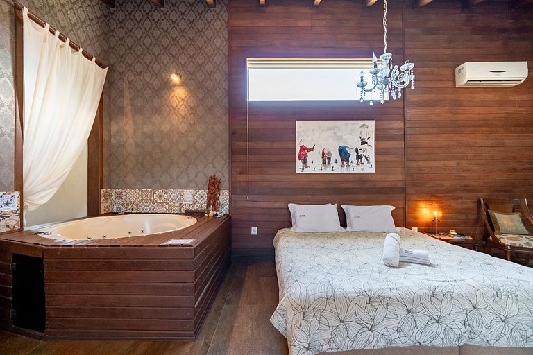 Shiva Chalé com hidro na Barra da Lagoa by Achei